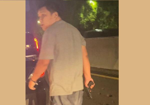 Viral Pria Pakai Mobil Dinas Polisi Acungkan Pistol ke Pengemudi Taksi Online, Ini Pejelasan Polda Metro Jaya 