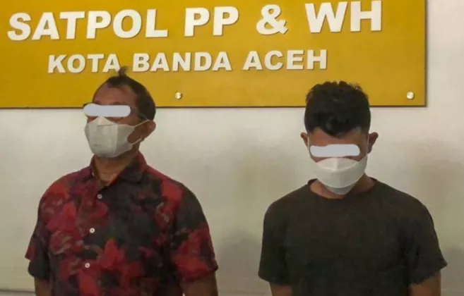 Tampang Kepala Inspektorat Banda Aceh yang Ditangkap Sedang Berduaan dengan Pasangan Sejenis di Ruang Kerja