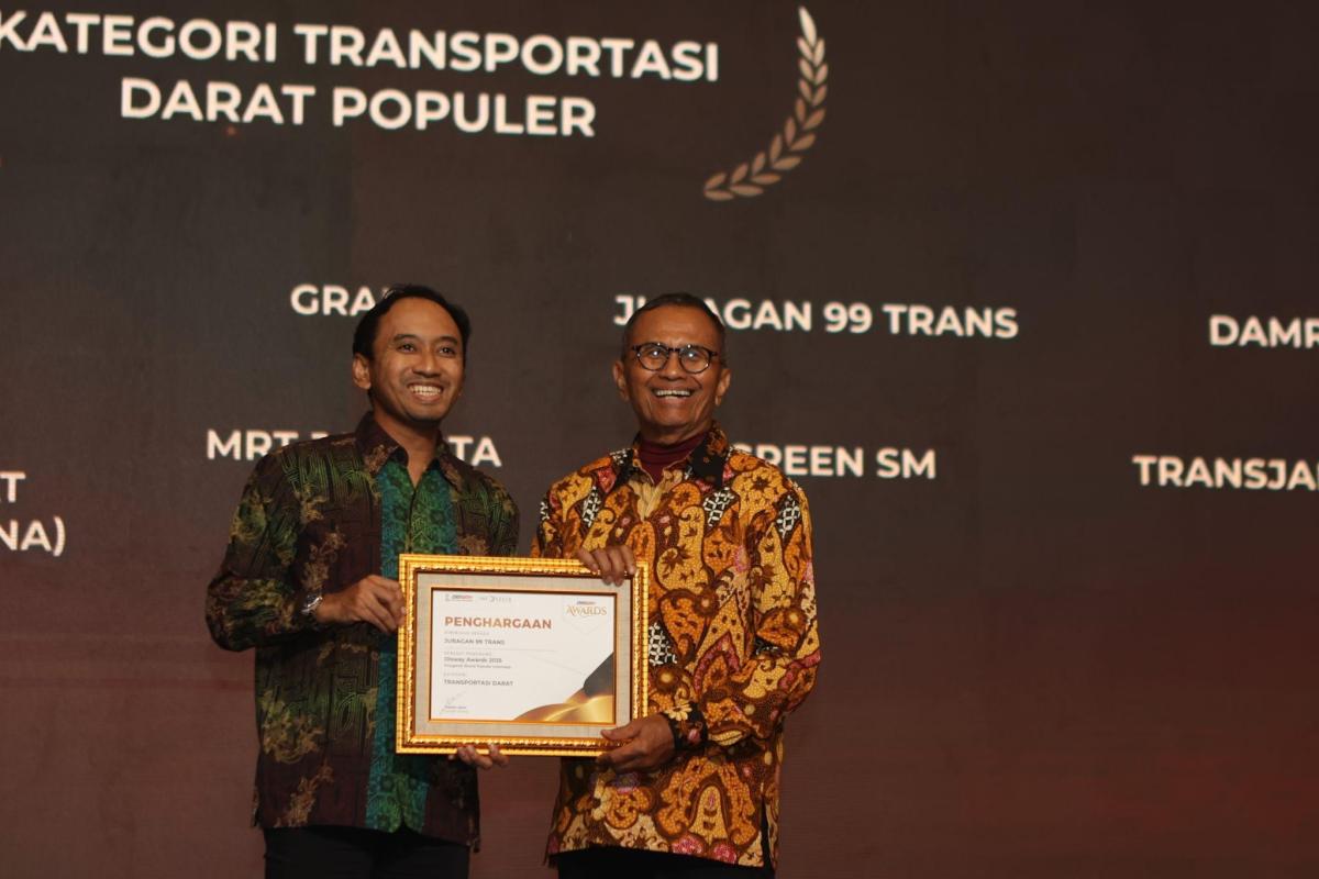 Juragan 99 Trans Toreh Prestasi Brand Terpopuler Transportasi Darat di Disway Awards, Tegaskan Kualitas Layanan Premium